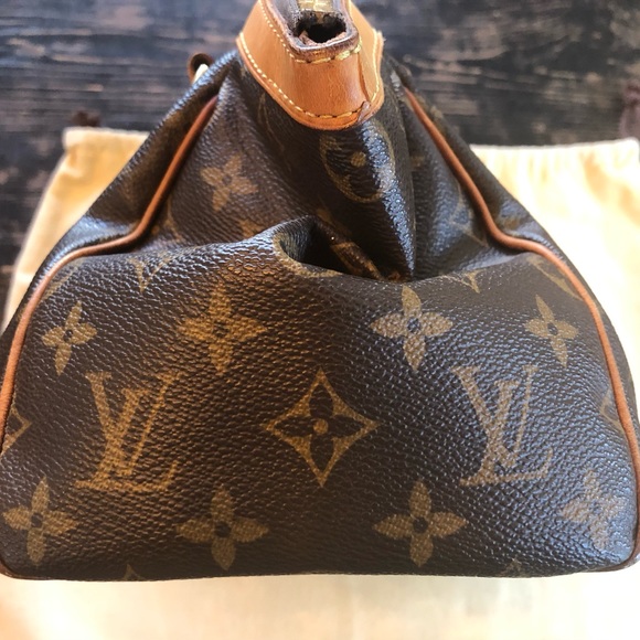 COPY - ๐ฏ Authentic Louis Vuitton Tivoli PM handbag. AUTHENTICATED - Picture 11 of 17